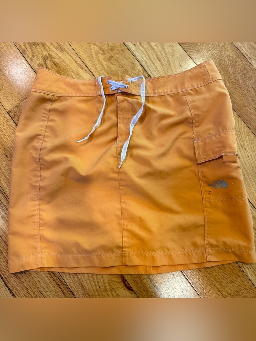 The North Face Orange Mini Skirt with Drawstring Waist